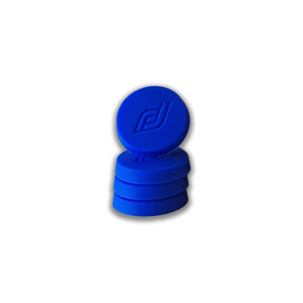 Stack of blue silicone caps stacked together, top cap with embossed logo